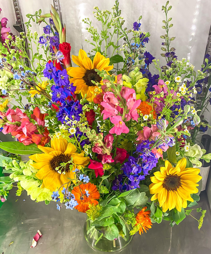 An over the top floral arrangement by wildly native flower farm