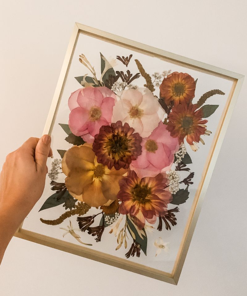 pink and yellow pressed florals with gold frame