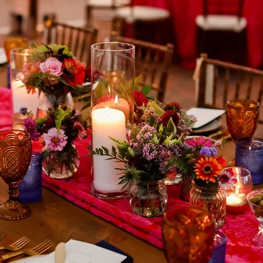 flowers and candles on moody table