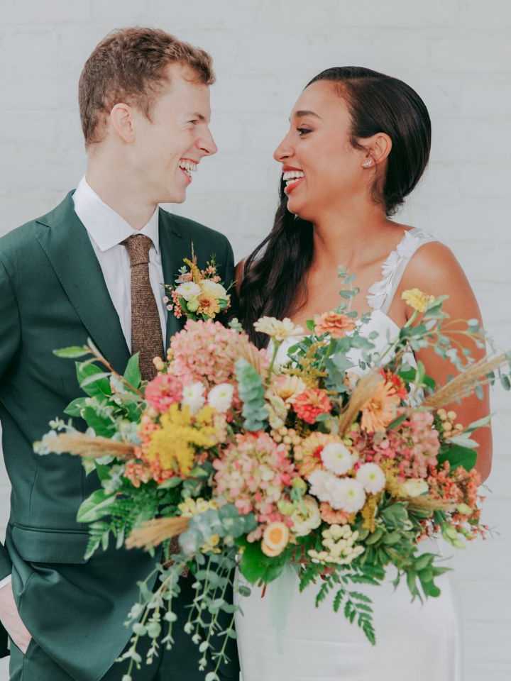 Bride and Groom with Wildly Native Flower Farm Bouquet