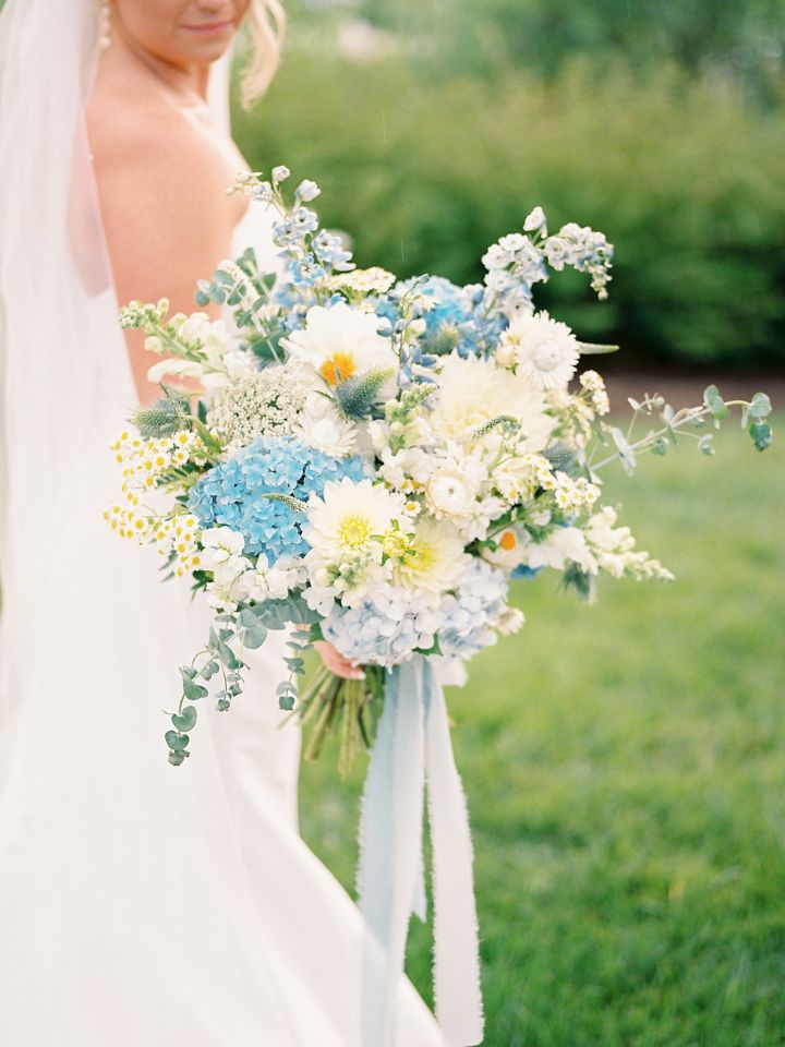 blue and white florals in wedding bouquet for kylie
