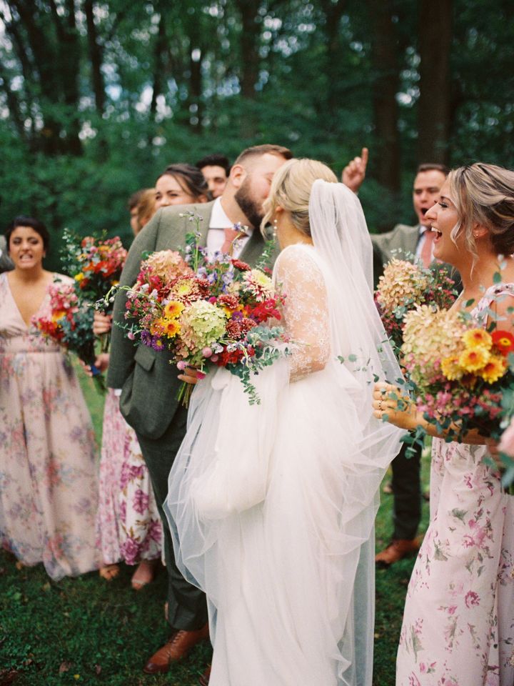 colorful flowers with bridal party