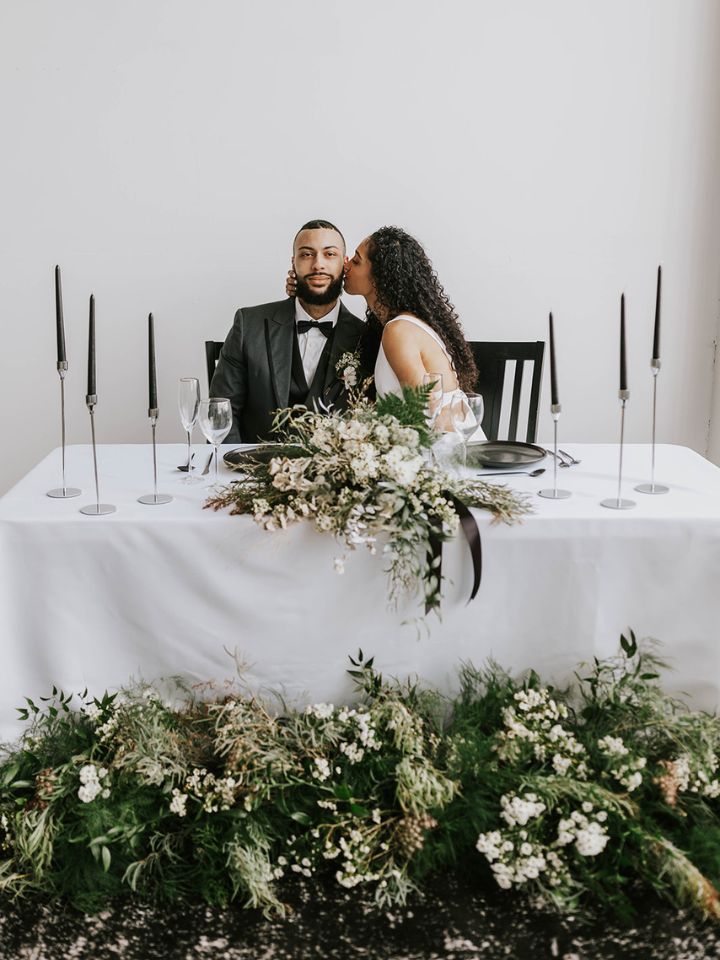 sweetheart table with green and white flowers