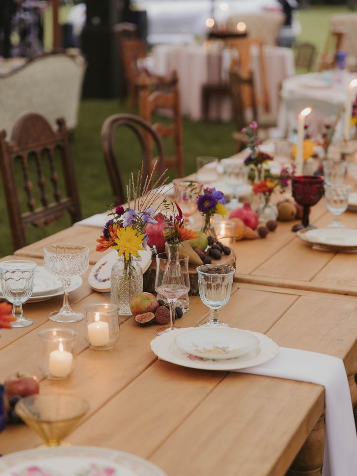 wedding harvest tables with fruit and candles
