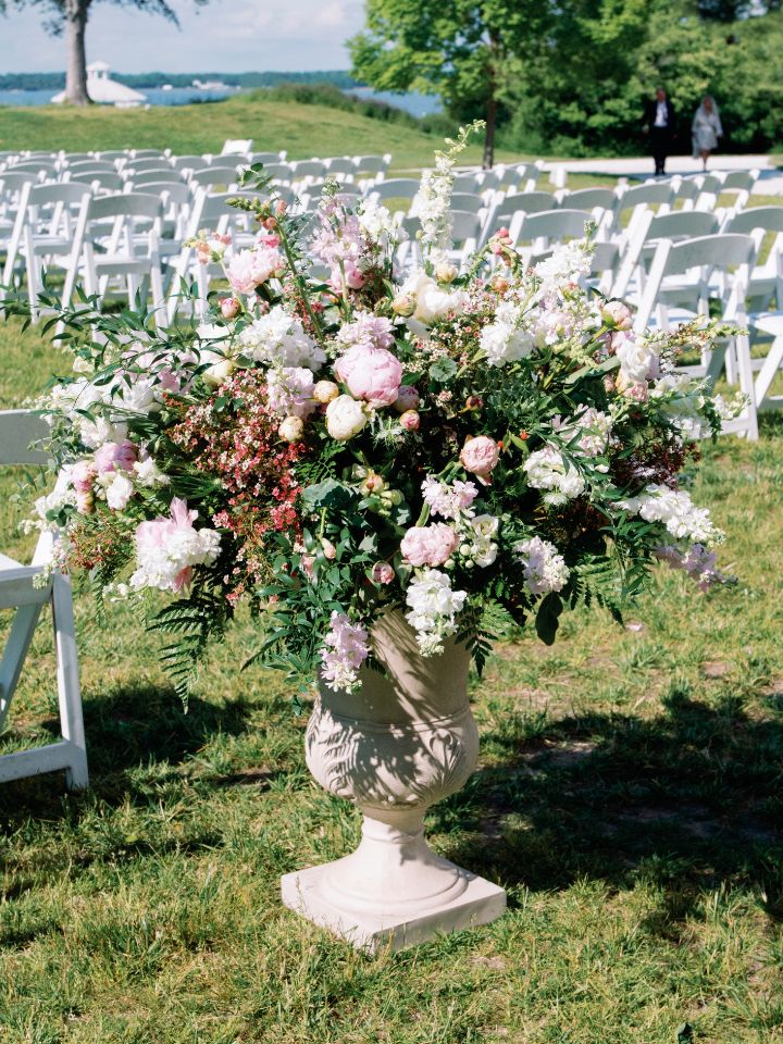 large pink and white urn for end of the isle