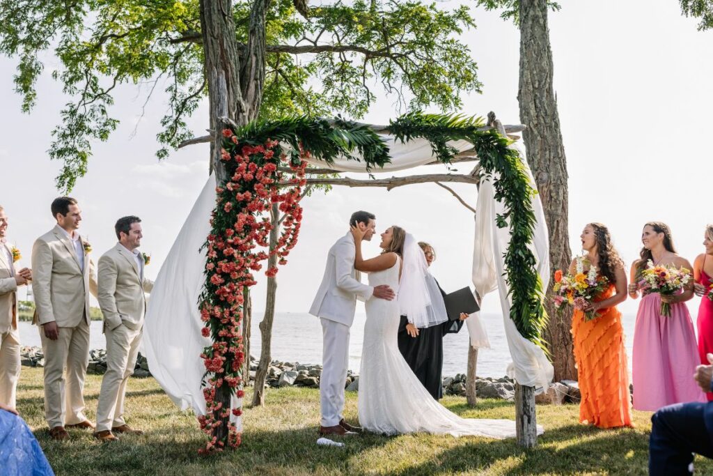 flower curtain on front of chuppah