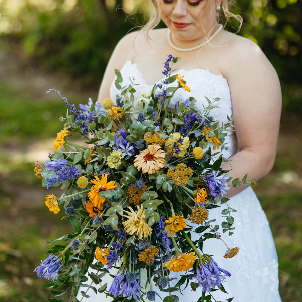 cascading bouquet with gold and blue colors