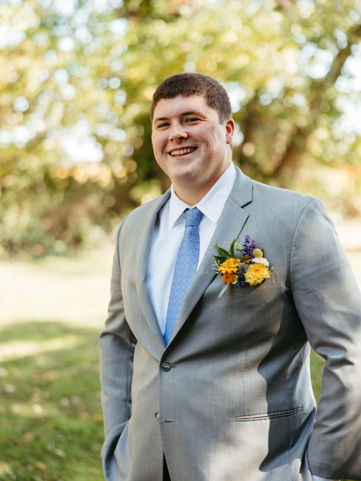 Groom wearing Wildly Native Boutonniere