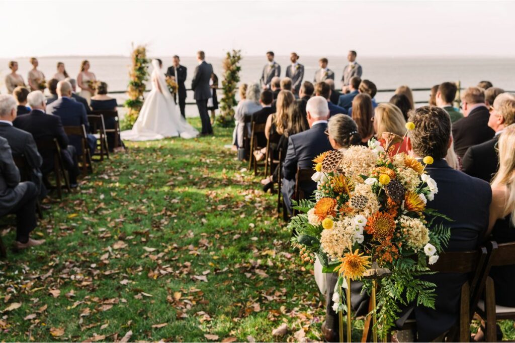 ceremony with pedestal at the end of the aisle