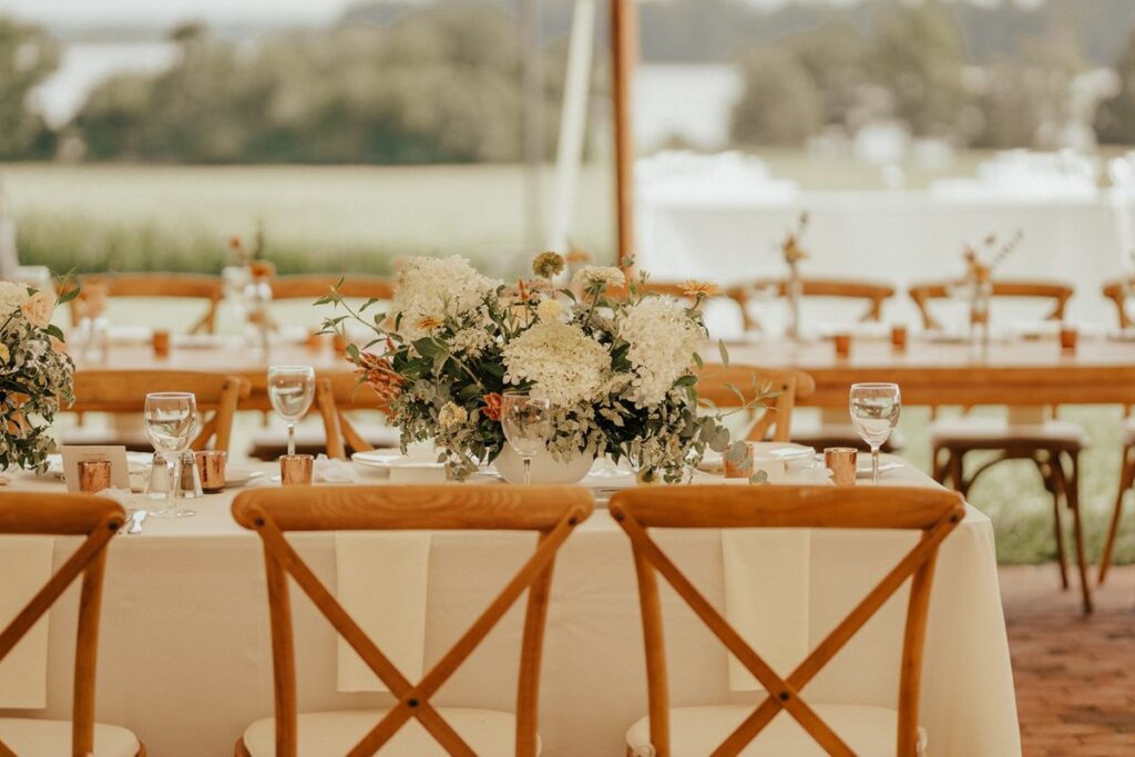 Rectangle guest table under tent at reception at Brittland Manor