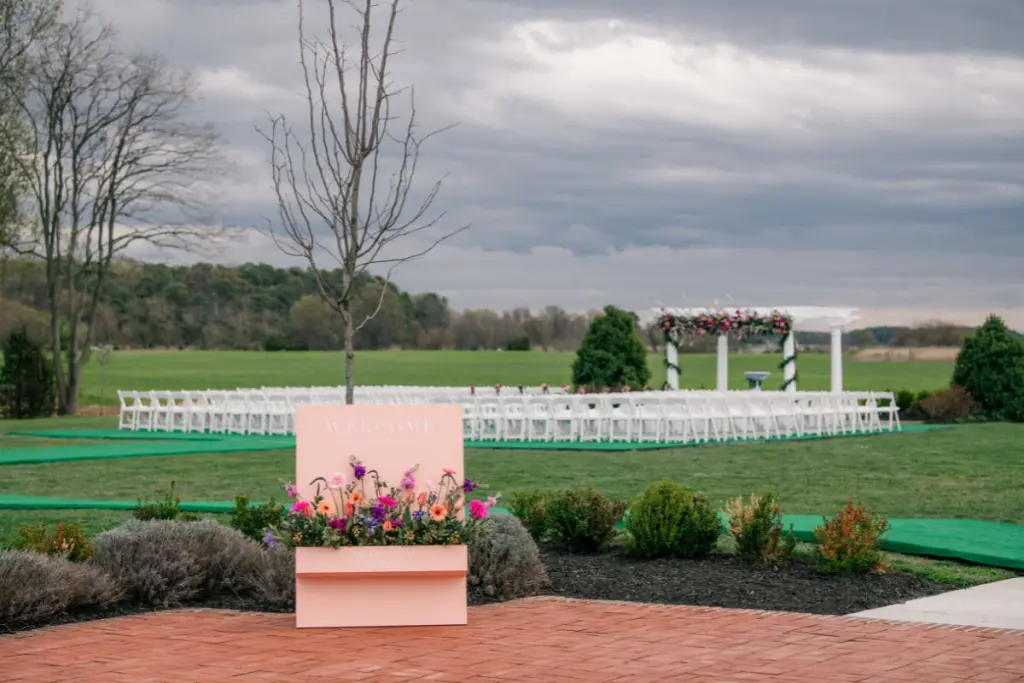 Wide shot of outdoor pergola at Kent Island Resort for wedding ceremony