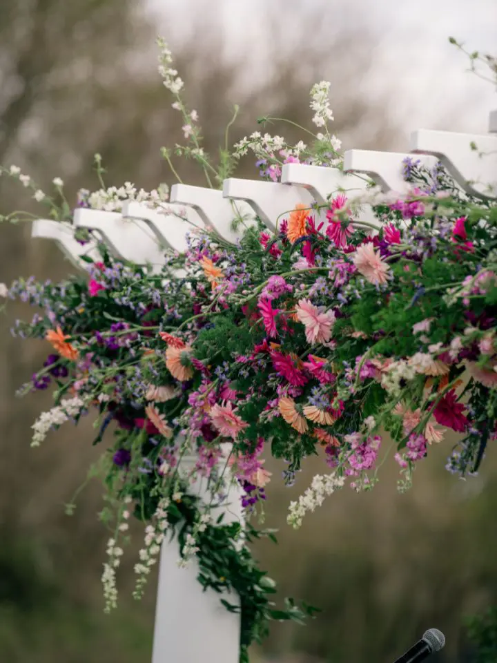 Bright colorful oasis garland bursting with flowers