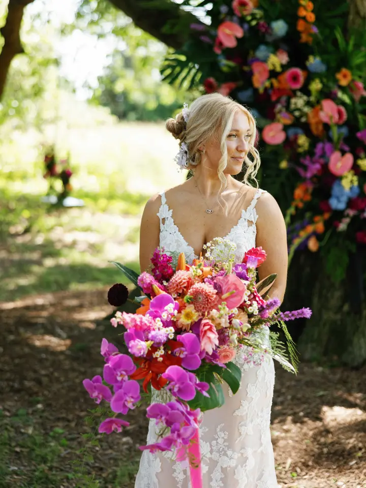 Lizzy's showstopper bouquet in a variety of pinks, oranges and colorful florals